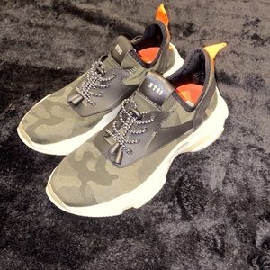 Steve Madden camo green sneakers.
